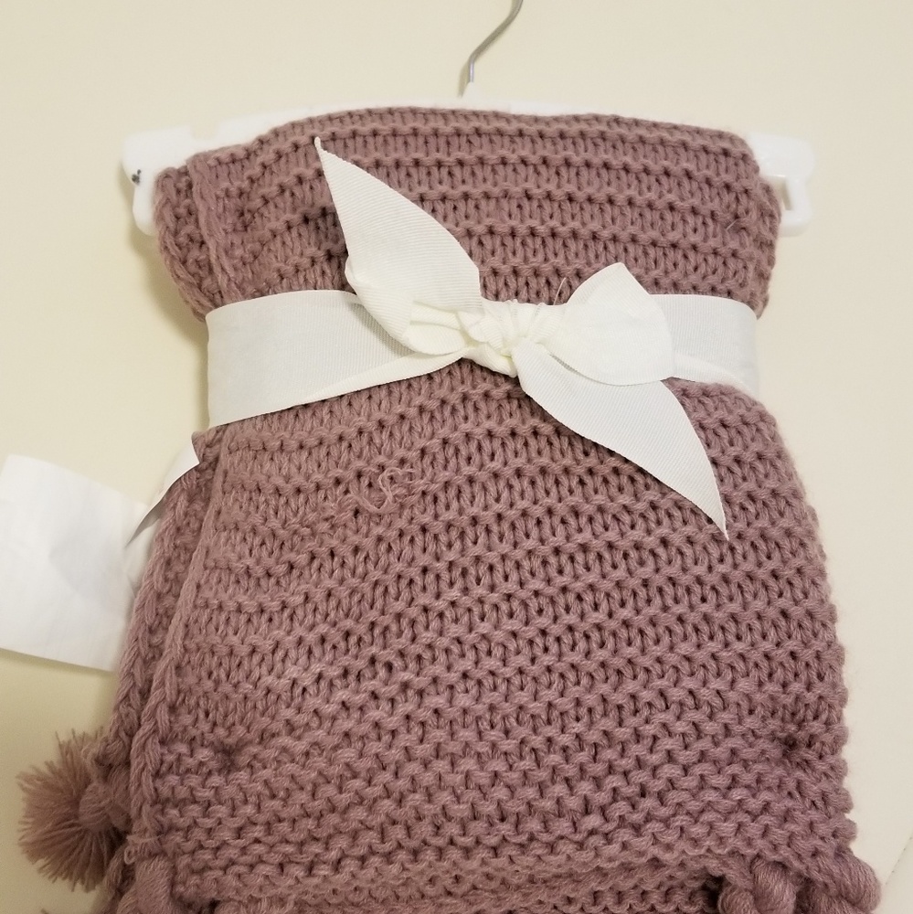 Plum color knit blanket with tassel corners